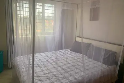 Image de Cozy apartment in quiet neighborhood 30 minutes from Entebbe airport