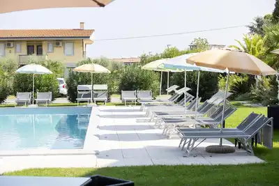 Image de Résidence Molino Trilocale 8 avec piscine, terrasse et Wi-Fi