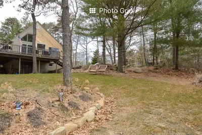 Image de Cape Breeze well maintained home on pristine pond!