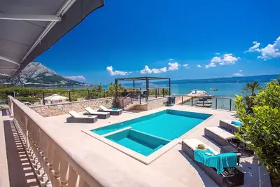 Image de Beachfront Villa Draga with 32sqm private, heated pool, 4 bedrooms, sea view