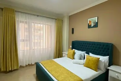 Image de 15 mins from Jkia & Train Station, adjacent to Nairobi National Park