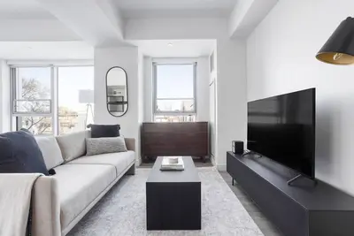 Image de Lovely Central Square Studio w/ Gym, W/D & Roof, near T, by Blueground