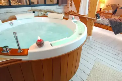 Image de Appartement Cosy avec baignoire Balnéo dans la chambre et filet de Catamaran