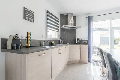 Image de Maison neuve avec terrasse et pergola