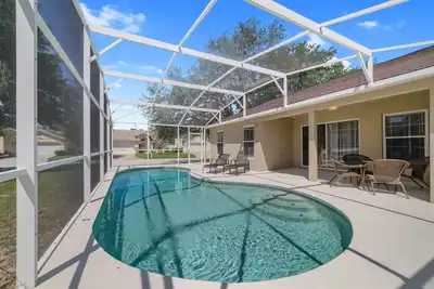 Image de Sophisticated Sanctuary – South-Facing Pool - 10 Minutes to Disney
