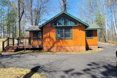 Image de Pinewood Cabin on Upper Eau Claire Lake in Barnes, Wi