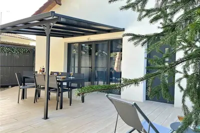 Image de Maison 4 chambres dans résidence avec piscine