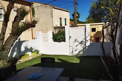 Image de T2 paisible, avec jardin ombragé