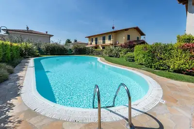 Image de Appartement de vacances Raffa avec balcon, terrasse couverte et Wi-Fi