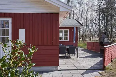 Image de Maison de vacances pour 4 a Rønne-By Traum