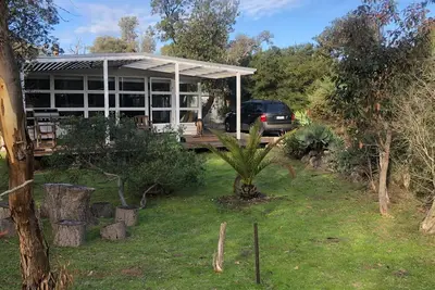 Image de The Glasshouse -  Nestled amongst ti-trees and other native flora