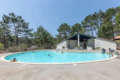 Image de \"Villa Proche Océan et Golf\" avec jardin et piscine