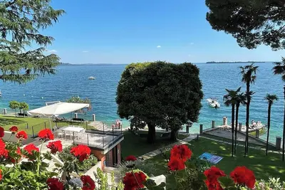 Image de Maison de vacances \"Jessika\" au bord du lac avec jardin commun et Wi-Fi