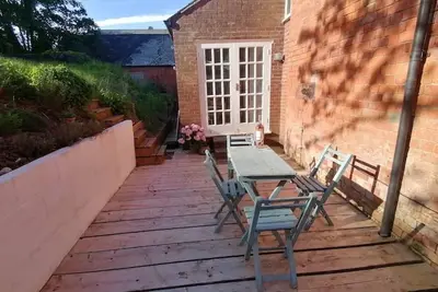 Image de Stable block conversion set in peaceful parkland