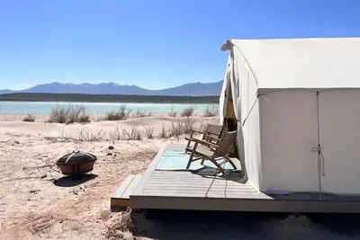 Image de Beautiful wall tent on sandy beach at waters edge