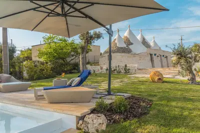 Image de Maison de vacances « Trulli Terralunga » avec piscine et Wi-Fi