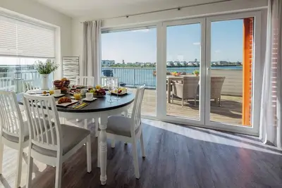 Image de Maisonette apartment Ostseeflair by Seeblick Ferien Oro, first row of water, E-pillar