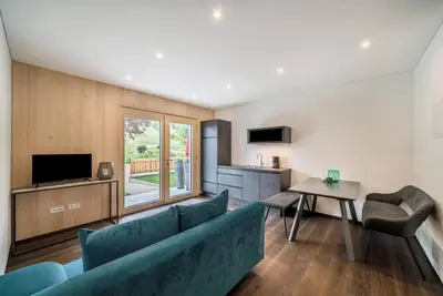 Image de Appartement 'Alpreid Moderne Tanne' avec vue sur les montagnes, jardin et Wi-Fi.