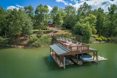 Easy Lakefront Access w/Dock, Firepit, & Mtn Views for Family Fun!