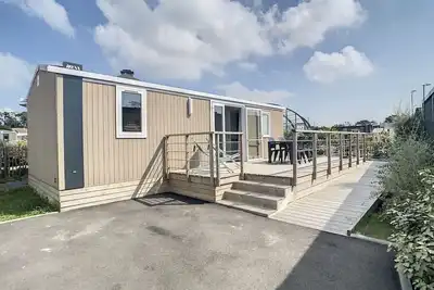 Image de Mobil-home Pmr tout confort, 200m plage, piscine, 4 pers, 2 chambres, parking, wifi, ménage inclus