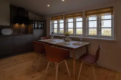 Image de Haus Nord Windstärke 5 (including breakfast) - Oldsens - Holiday apartments