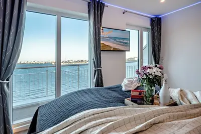 Image de Villa 'Kapitän James Cook2' avec vue sur la mer, terrasse privée et Wi-Fi