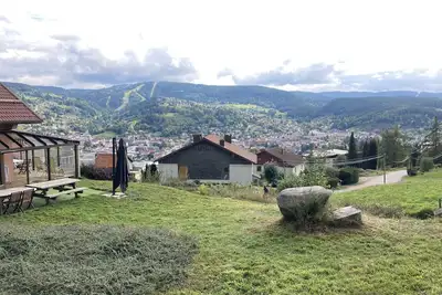 Image de Chalet avec piscine intérieure chauffée et vue exceptionnelle