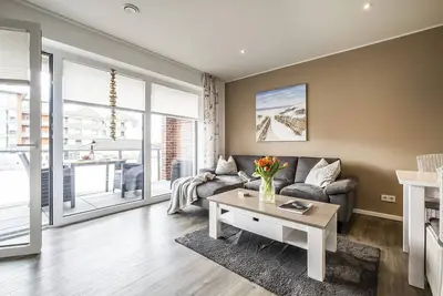 Image de Haus Strandläufer - vacation apartment for 2 people on the North Sea dike