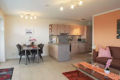 Image de Haus Strandläufer- vacation apartment for 4 people on the North Sea dike
