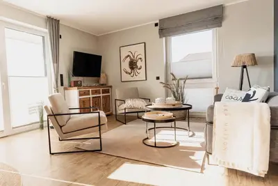 Image de Haus Strandläufer - vacation apartment for 4 people on the North Sea dike