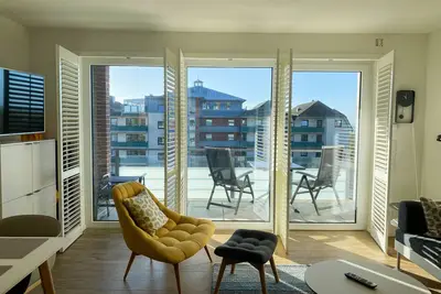 Image de Haus Strandläufer - vacation apartment for 2 people on the North Sea dike