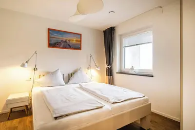 Image de Haus Strandläufer - vacation apartment for 2 people on the North Sea dike