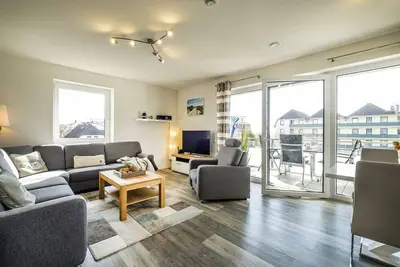 Image de Haus Strandläufer - vacation apartment for 4 people on the North Sea dike