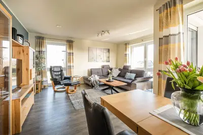 Image de Haus Strandläufer - vacation apartment for 4 people on the North Sea dike
