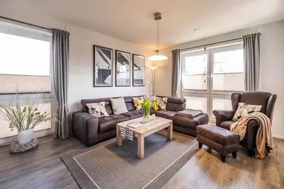 Image de Haus Strandläufer - vacation apartment for 4 people on the North Sea dike