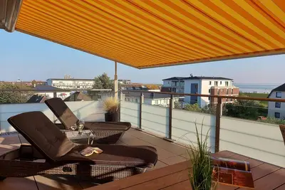 Image de Haus Strandläufer - vacation apartment for 4 people on the North Sea dike