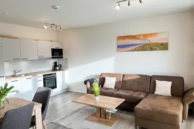 Image de Haus Strandläufer - vacation apartment for 2 people on the North Sea dike