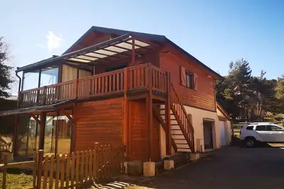 Image de Joli chalet66210-88m²-3ch-6 couchages-double garage-jardin-véranda-wifi- calme