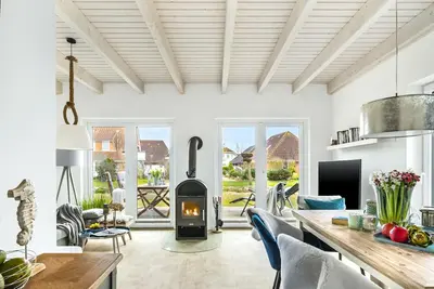 Image de Perlenhus - close to the North Sea and the beach, terrace, sauna, fireplace, modern