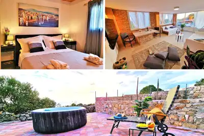 Image de Holiday houses Escape A&B, 2x jacuzzi, sun terrace with a view, privacy