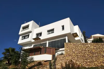 Image de Modern house with indoor pool in urbanization with security service.