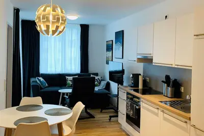 Image de New holiday apartment - close to the center, quiet with parking space and loggia