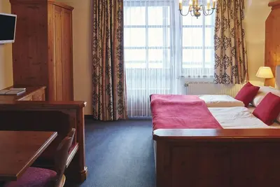 Image de Doppelzimmer Oim Haus, 27 m² - Kinderhotel Stegerhof