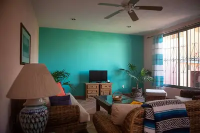 Image de Steps to the beach with a rooftop ocean view.