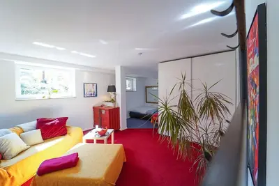 Image de Vacation apartment 47 sqm in the basement, bright and modern, quiet with shared use of the garden