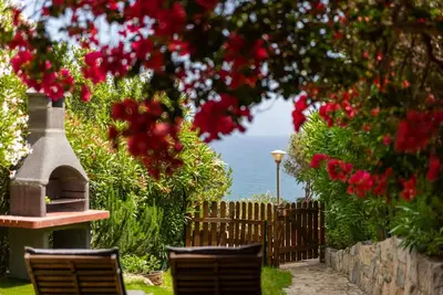 Image de Maison de vacances 'Bougainville' avec vue sur la mer, terrasse privée et Wi-Fi