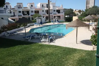 Image de 🏖️ Cozy Apartment | Pool, Balcony & Close to the Sea 🌊