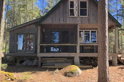 Image de Cozy, Off-Grid Camp on Spectacle Pond w/ private water frontage!