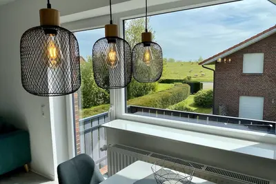 Image de Vacation apartment Deichblick with 45sqm, 1 bedroom, 1 living-bedroom, balcony, max. 4 persons