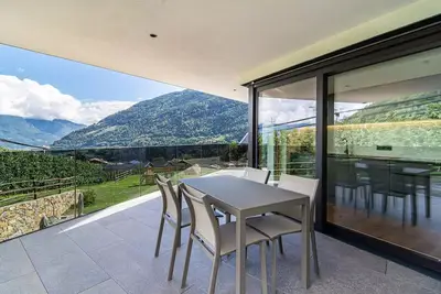Image de Appartement Hofer Hof Tschigat avec vue sur les montagnes, Wi-Fi et terrasse.